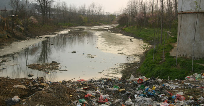 Trash Along A Huai River Tributary In Bengbu